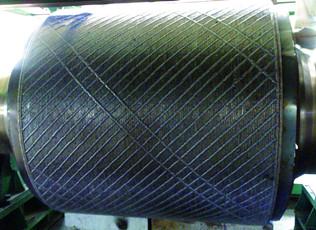 Surfacing wire for cement extrusion roll